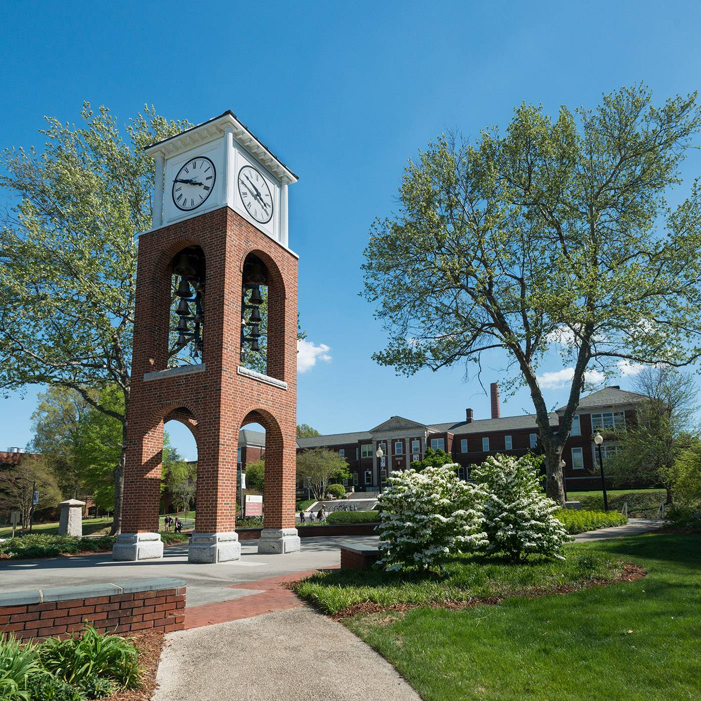 The UNC Greensboro bell tower on a clear day.